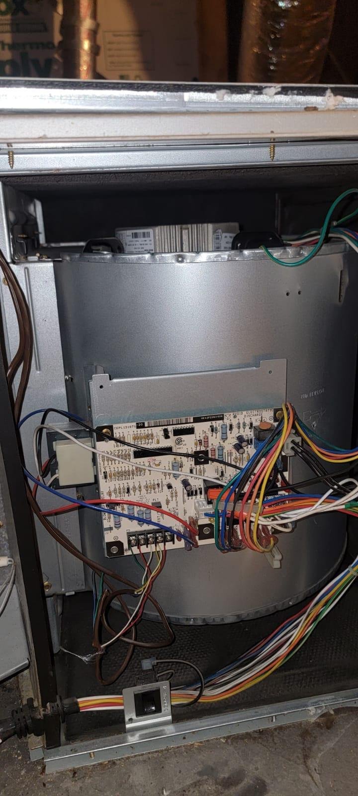 Jersey Village AC repair expert inspecting unit
