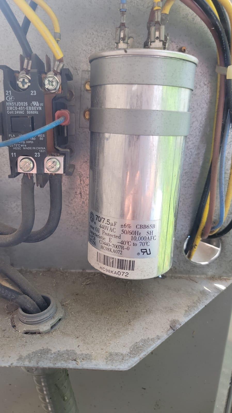 Expert Hvac Repair Services in Houston Tx | Hvac 247 Pro- 10 Top Houston Local Services Professional HVAC technician repairing wiring in Houston TX