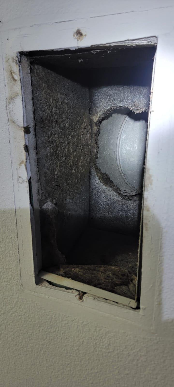 Professional HVAC technician repairing wiring in Houston, TX.