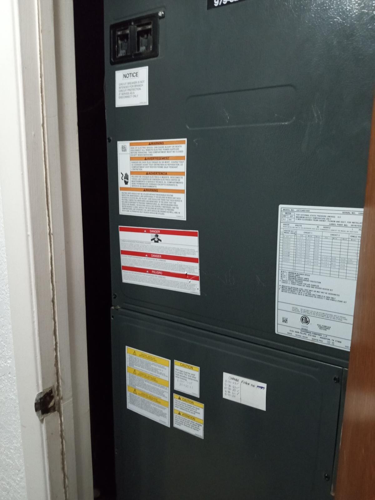 Furnace Repair by <a href= Professional HVAC technician repairing a furnace in Houston TX
