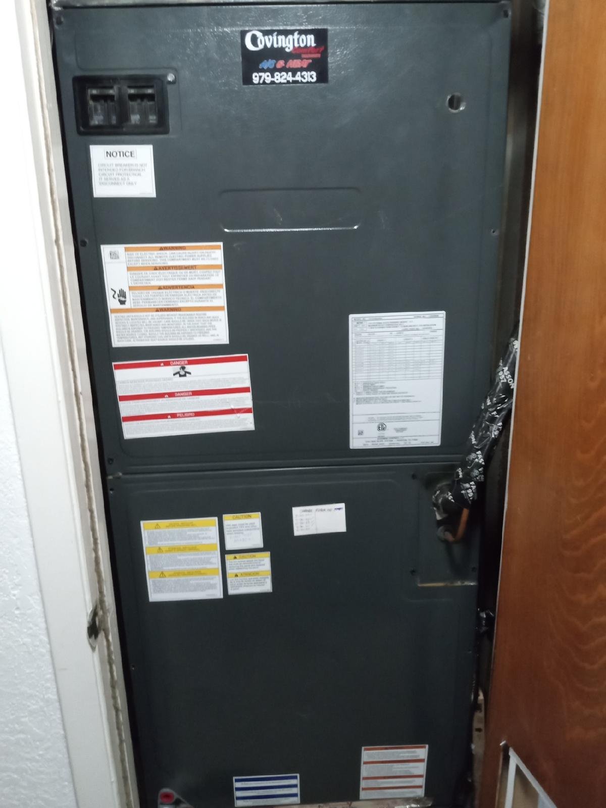 Furnace Repair by <a href= Professional HVAC technician repairing a furnace in Houston TX