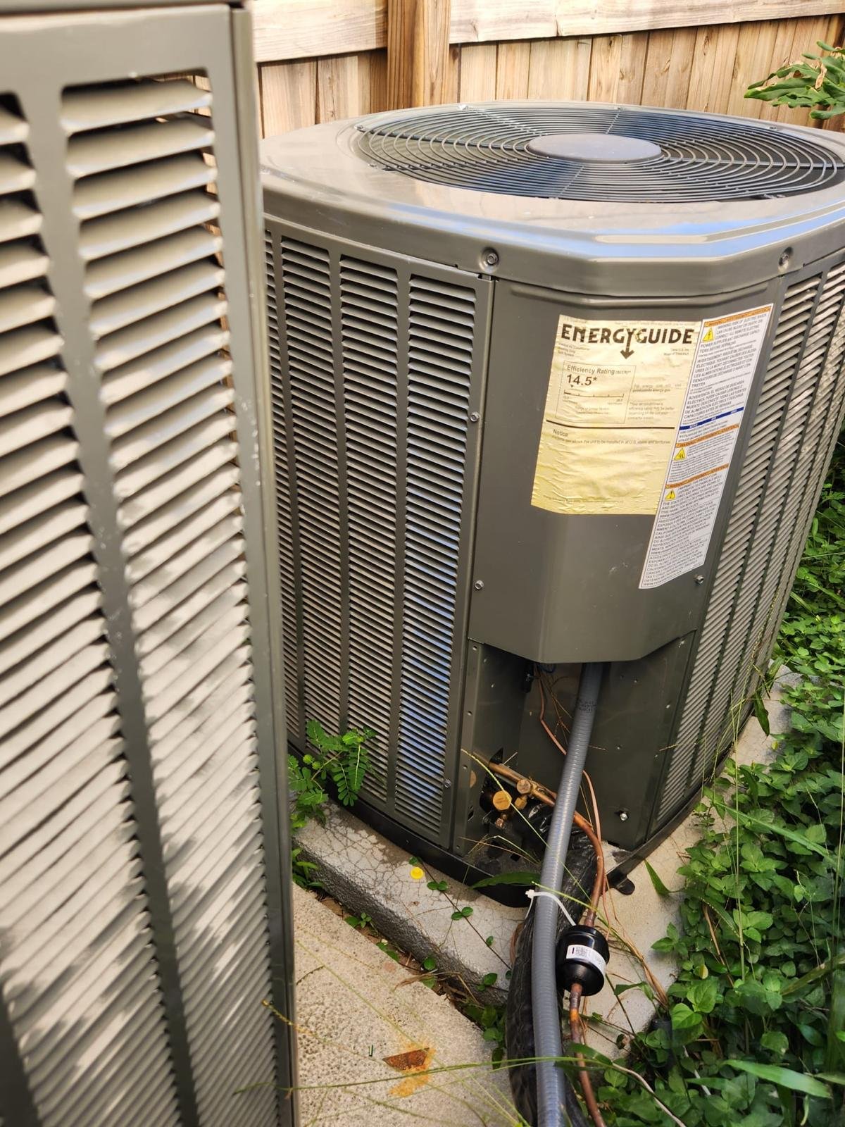 Furnace Repair by <a href= Professional HVAC technician repairing a furnace in Houston TX