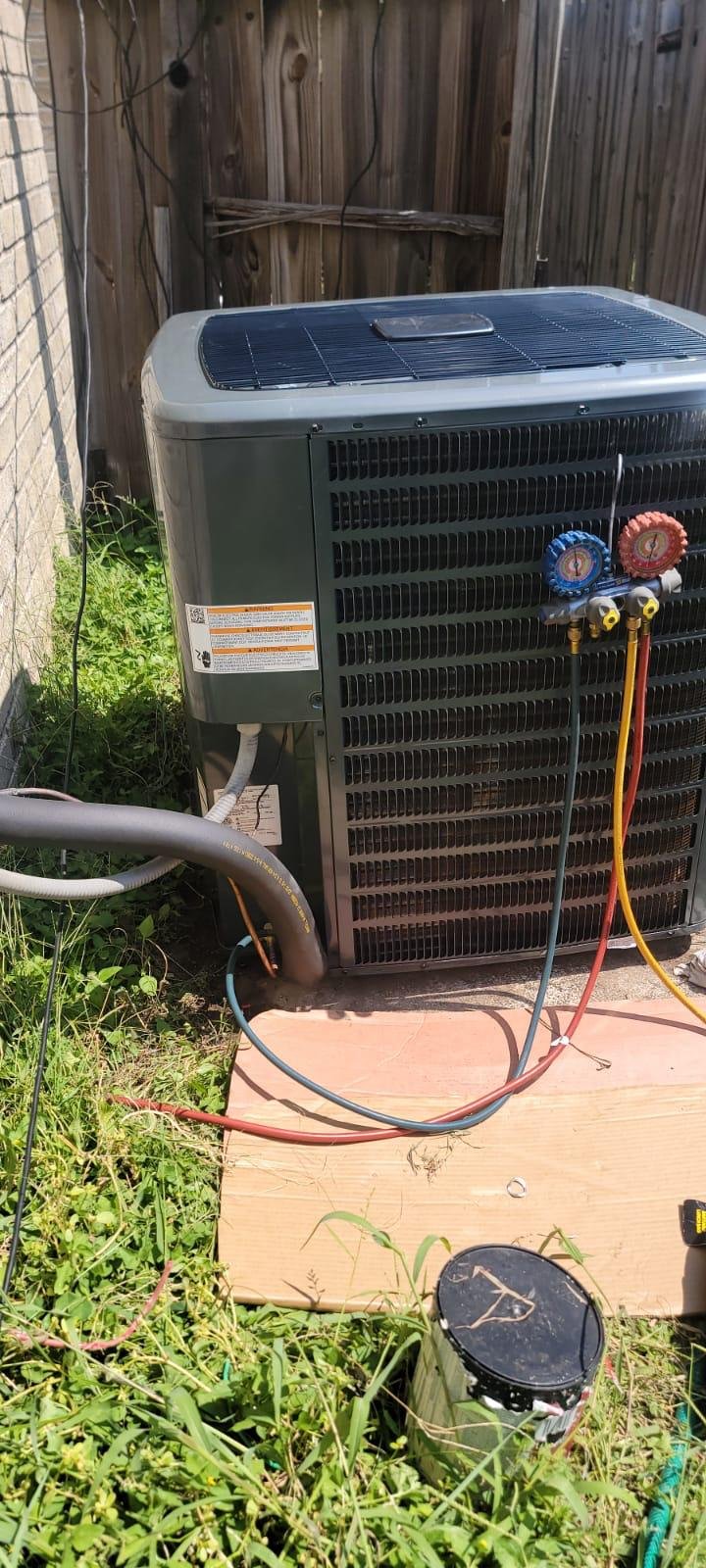 Upper Kirby HVAC system label during service
