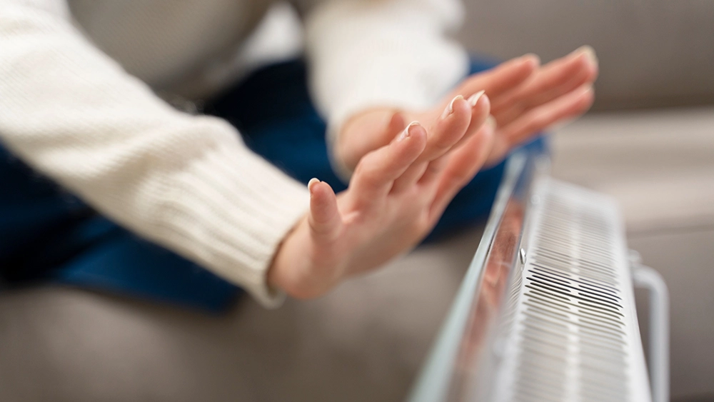 "Professional HVAC technician working on an air conditioning unit, providing reliable HVAC services."