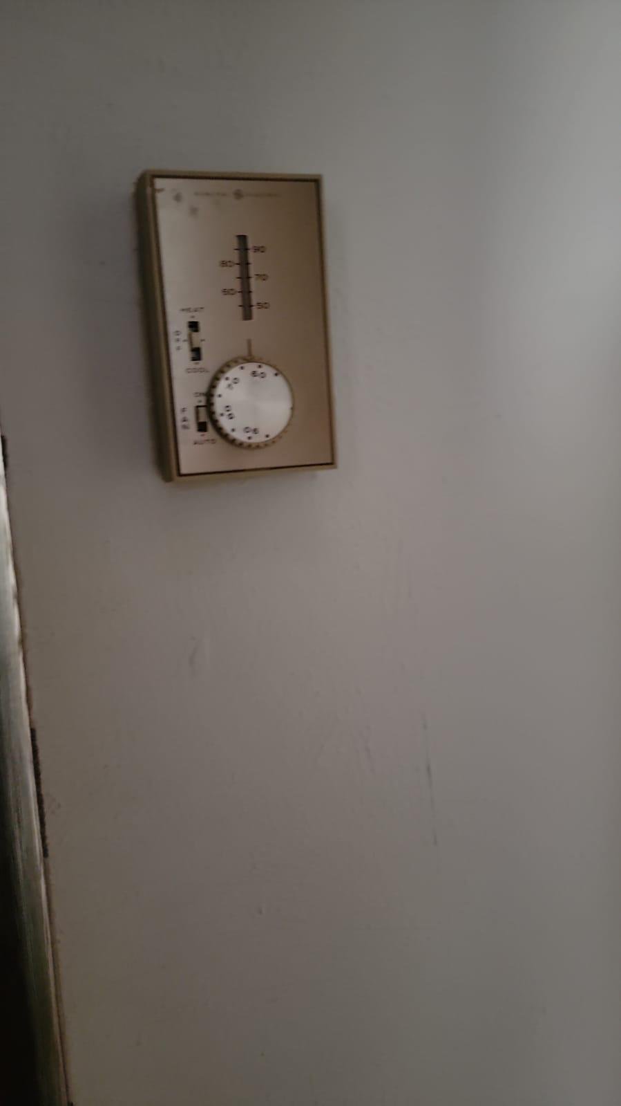 Houston Hvac Services - Vintage Thermostat | Hvac 247 Pro- 10 Top Houston Local Services Vintage thermostat in a Houston home showcasing professional HVAC services