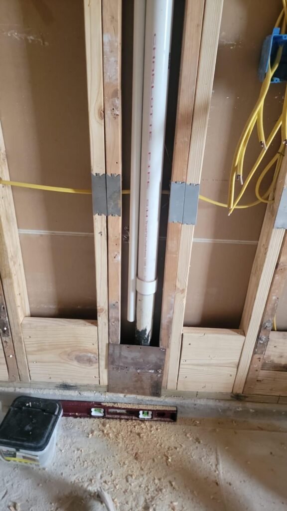 Professional HVAC technician performing an air conditioning installation in Houston TX